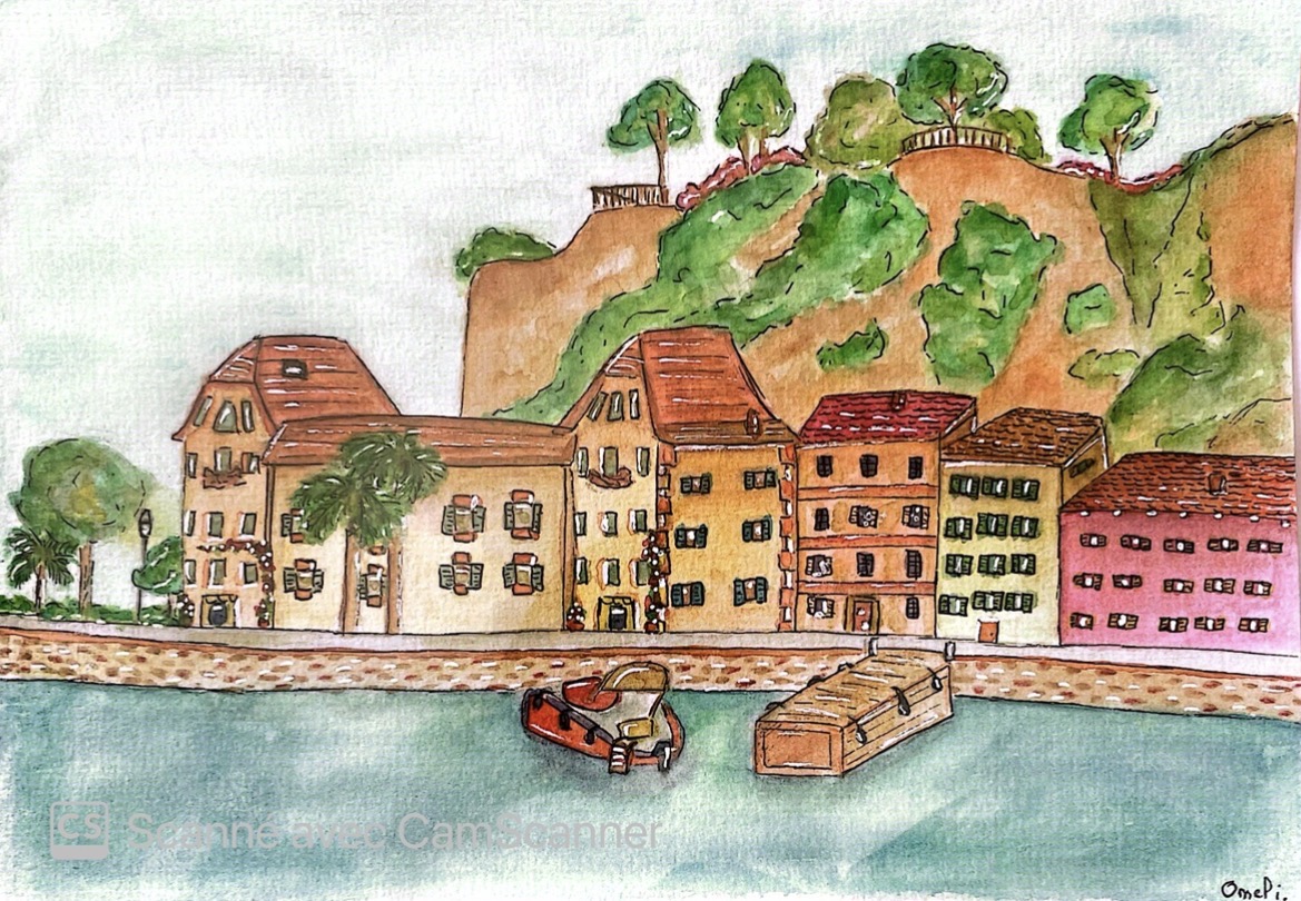 Maisons colorées au bord de l’eau, sous une colline arborée
